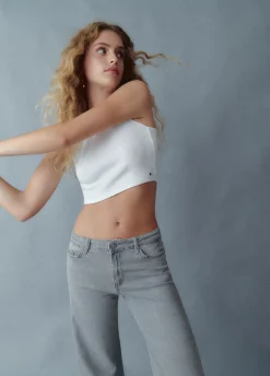 Jeans Acampanados Corte Lateral